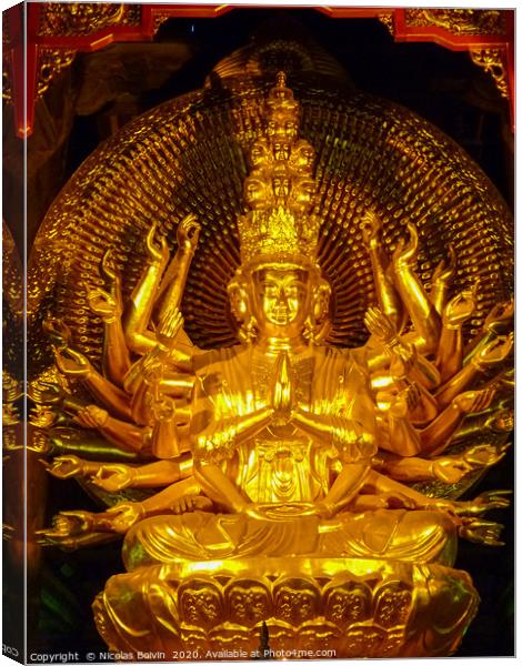 Golden statue in famous Bai Dinh temple Canvas Print by Nicolas Boivin