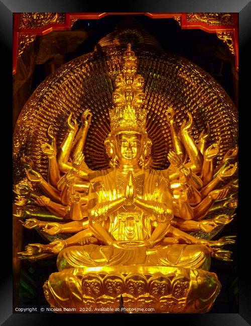 Golden statue in famous Bai Dinh temple Framed Print by Nicolas Boivin
