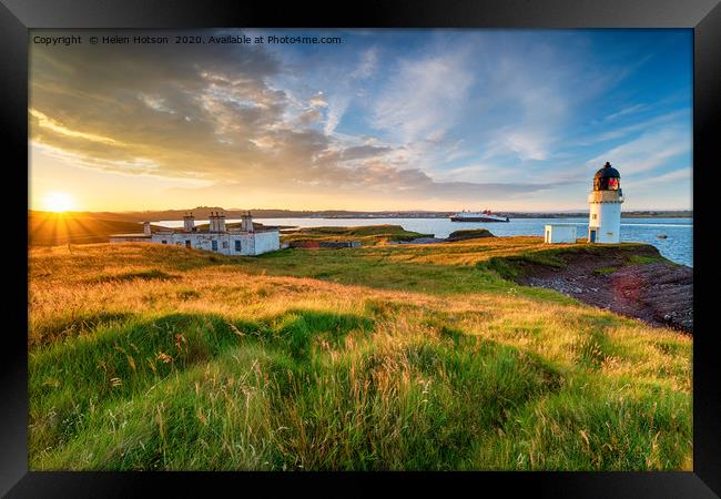 Stunning sunset over Arnish Point and it's lightho Framed Print by Helen Hotson