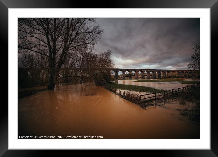 A fully flooded Harringworth Viaduct  Framed Mounted Print by James Aston