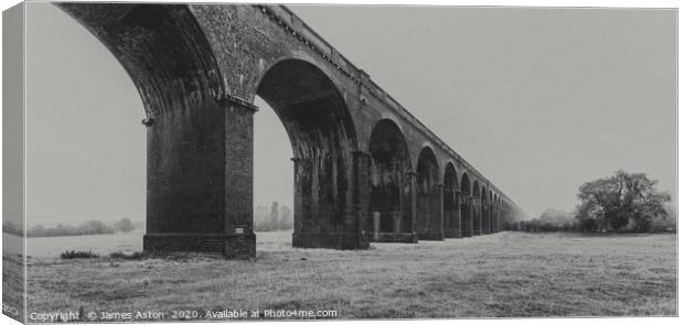 Misty Start to the Morning at Harringworth Viaduct Canvas Print by James Aston