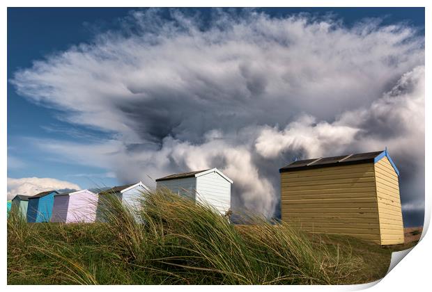 Kent Beach Huts with storm clouds Print by John Finney