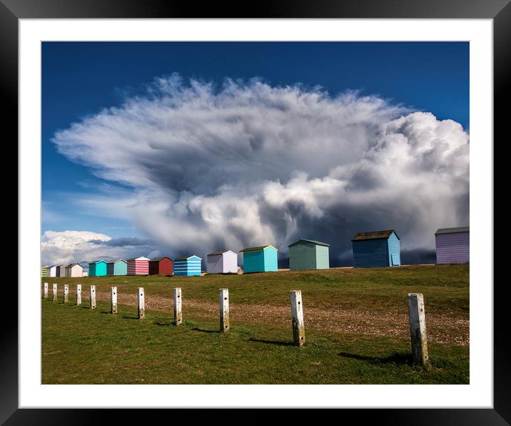 The Beach huts of Folkestone with Storm Katie  Framed Mounted Print by John Finney