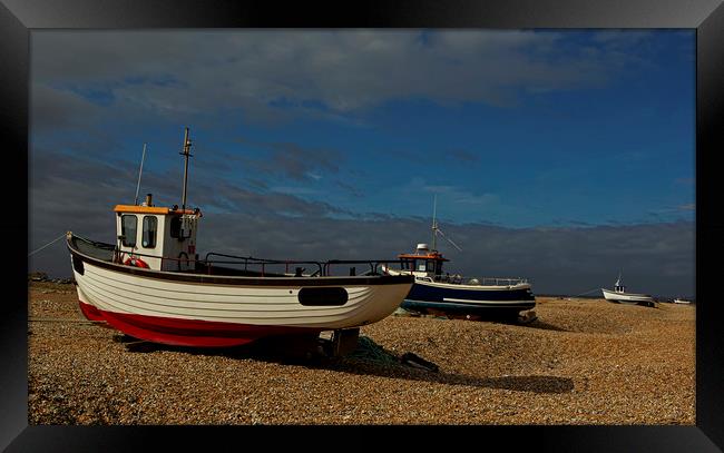 Boats moored on Dungeness beach Framed Print by Jenny Hibbert