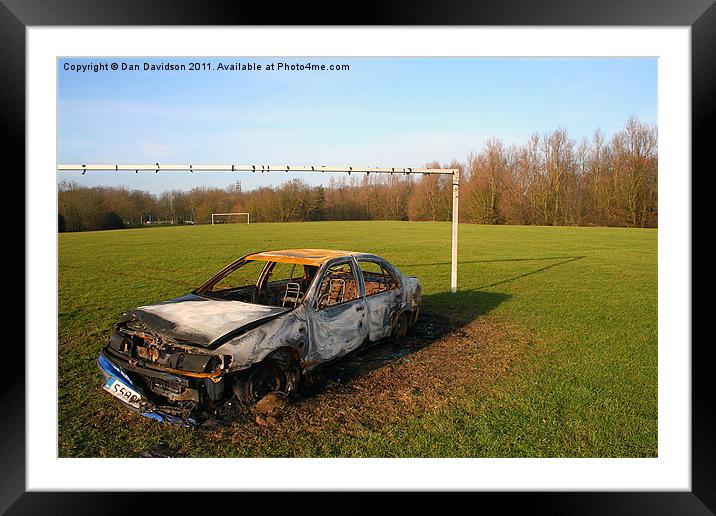 Stolen Car Between the Goalposts Framed Mounted Print by Dan Davidson