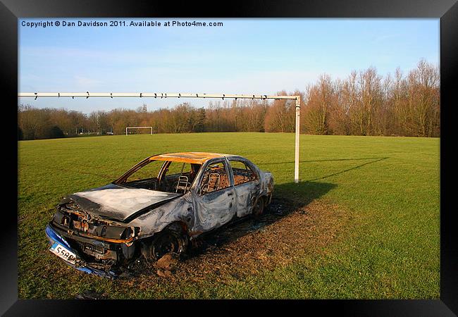 Stolen Car Between the Goalposts Framed Print by Dan Davidson