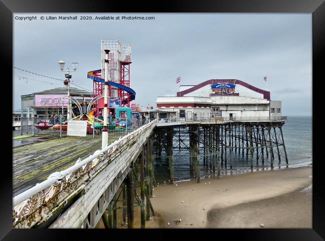 Grey  Skies, over North Pier Theatre . Framed Print by Lilian Marshall