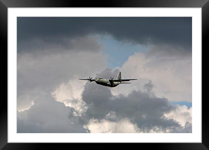 Hercules C130J in the distance Framed Mounted Print by Jenny Hibbert