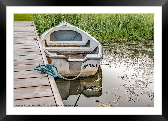 Boat tied to wooden staging on the Norfolk Broads Framed Mounted Print by Chris Yaxley