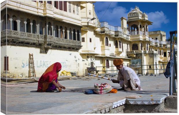 Udaipur, India : A Rajasthani man and woman in Ind Canvas Print by Arpan Bhatia