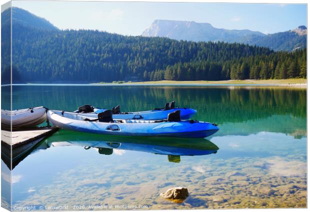 Gorgeous lake and mountain range in Montenegro Canvas Print by Lensw0rld 