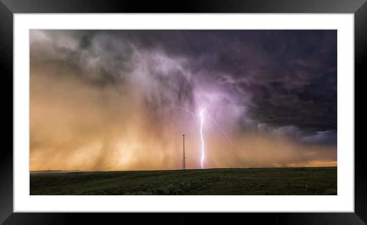 Massive Lightning Bolt next to a cell tower, USA. Framed Mounted Print by John Finney