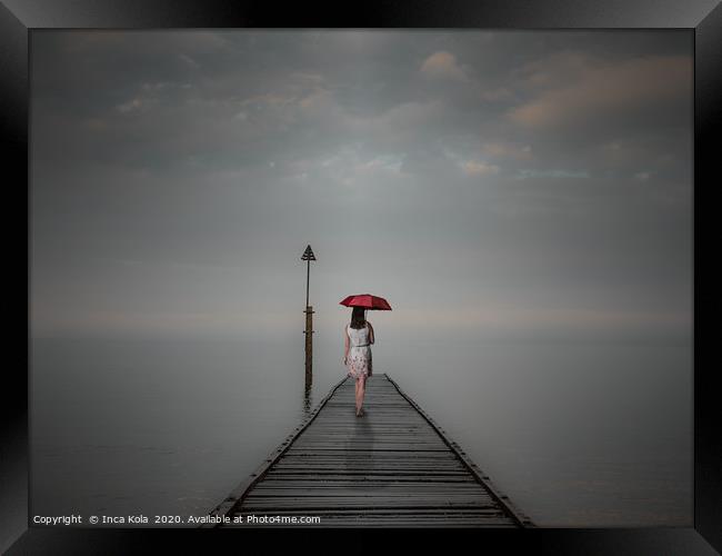 Solitude at the End of the Pier - blue tones Framed Print by Inca Kala