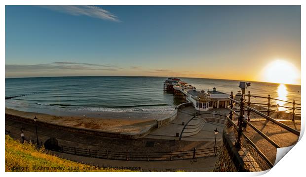 Fish eye view of Cromer pier at sunrise from above Print by Chris Yaxley