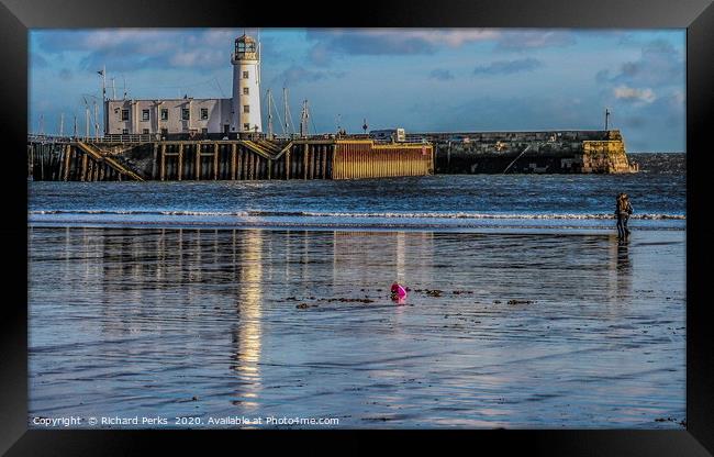 Enchanting Lighthouse Reflections Framed Print by Richard Perks