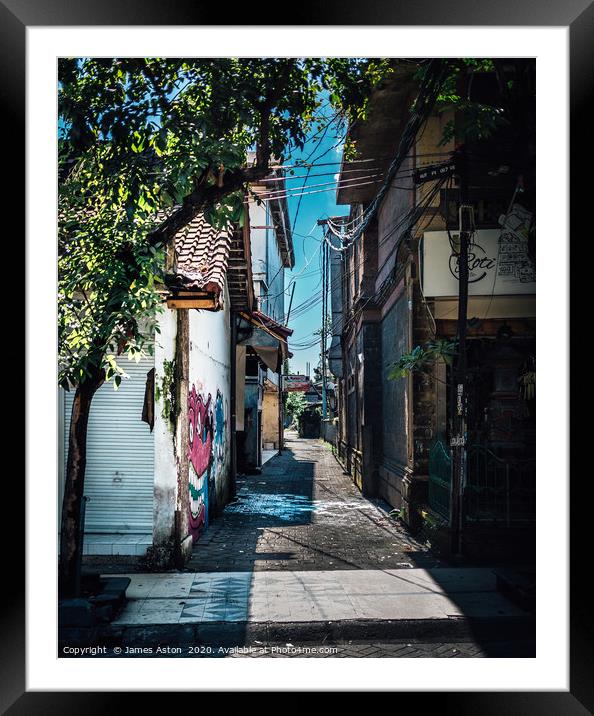 An Urban Side Street in Bali Framed Mounted Print by James Aston
