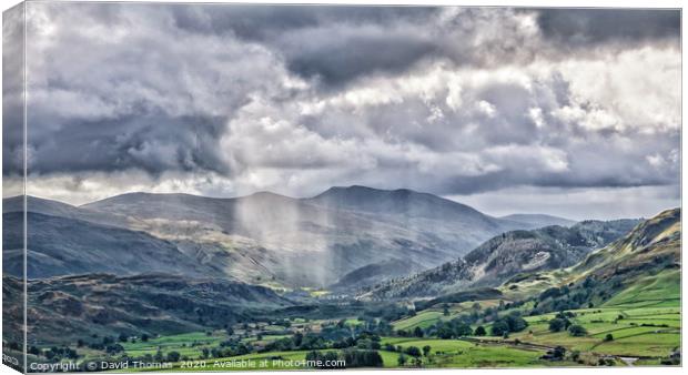 Dramatic Storm Light Over Lake District Canvas Print by David Thomas
