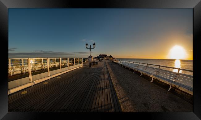 Fisheye view captured on Cromer pier at sunrise Framed Print by Chris Yaxley