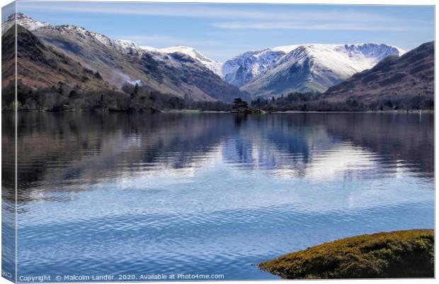 View across Ullswater to the snow capped Rake Crag Canvas Print by Malcolm Lander