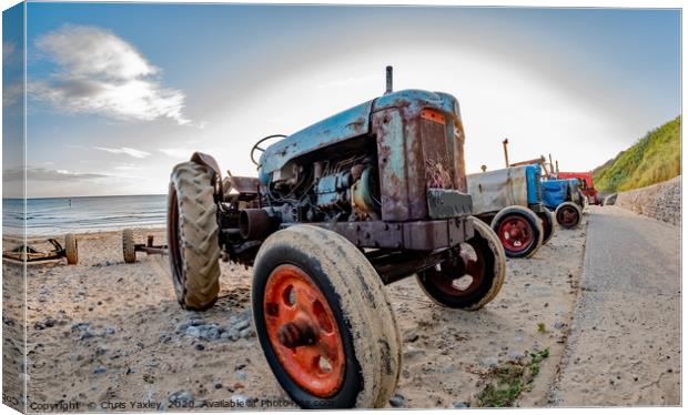 Close up and fisheye view of tractor on Cromer bea Canvas Print by Chris Yaxley