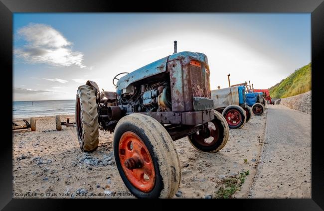 Close up and fisheye view of tractor on Cromer bea Framed Print by Chris Yaxley
