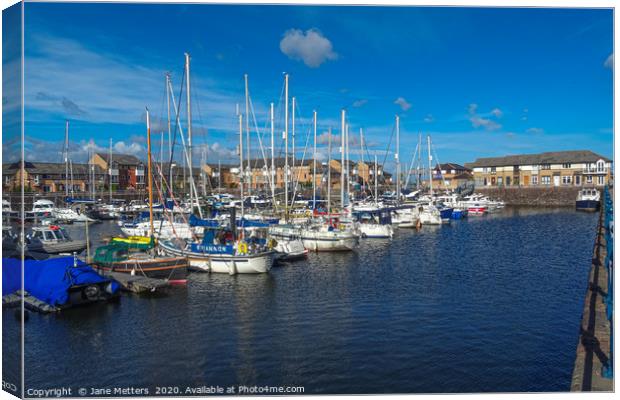 Blue Sky Over The Marina Canvas Print by Jane Metters