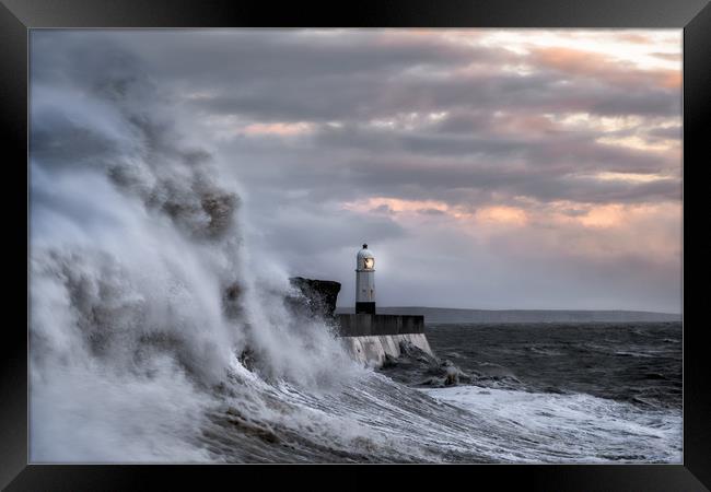 Porthcawl Lighthouse during Storm Framed Print by Roger Daniel