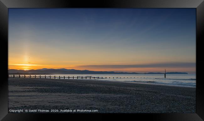 Glowing Rhyl Sunset Framed Print by David Thomas