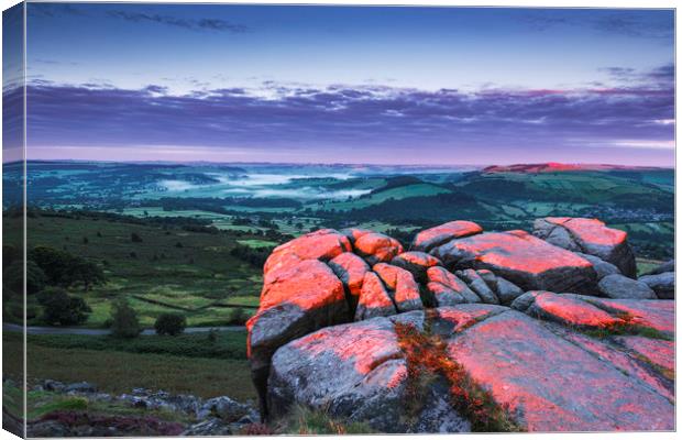 Red on the Rocks. Curbar Edge Derbyshire Canvas Print by John Finney
