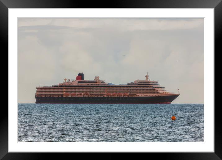 Queen Elizabeth moored off the Coast of Dorset Framed Mounted Print by Paul Brewer