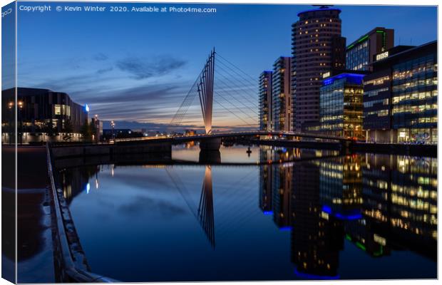 Bridge to the media City in Salford quay Canvas Print by Kevin Winter