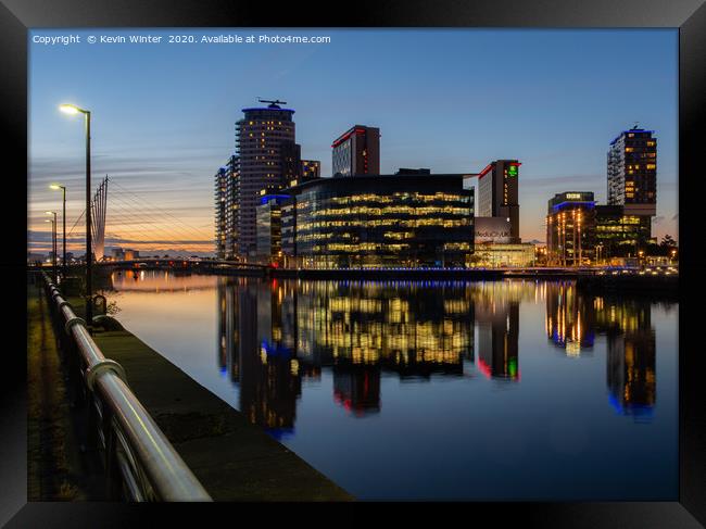 Across Salford quay Framed Print by Kevin Winter