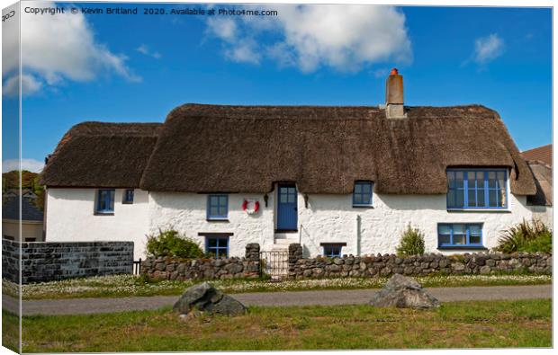 thatched roof cottage Canvas Print by Kevin Britland