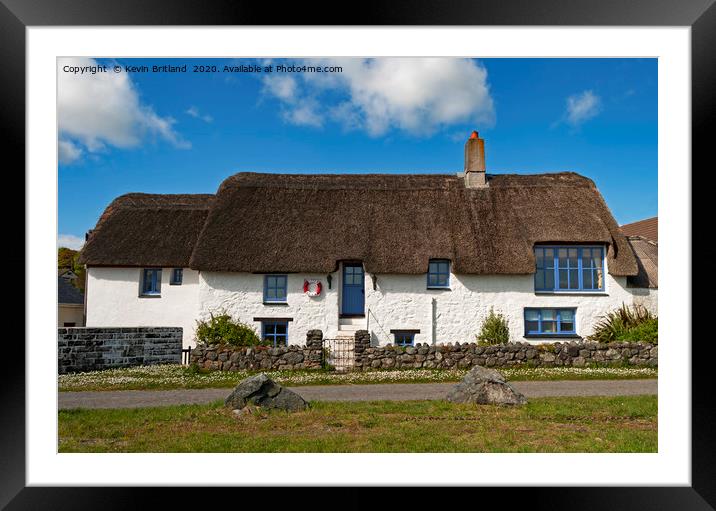 thatched roof cottage Framed Mounted Print by Kevin Britland