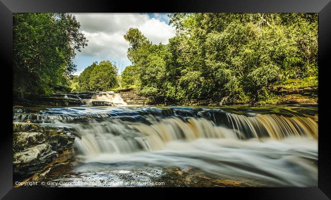A Yorkshire Waterfall Framed Print by Gary Clarricoates