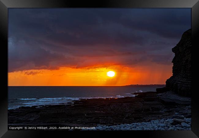 Sunsetting on a stormy evening at Dunraven Bay Gla Framed Print by Jenny Hibbert