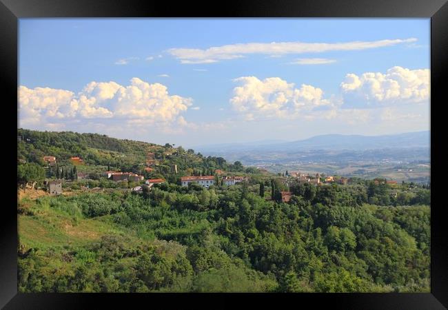 A view out over the countryside of Tuscany, Italy Framed Print by Simon Marlow