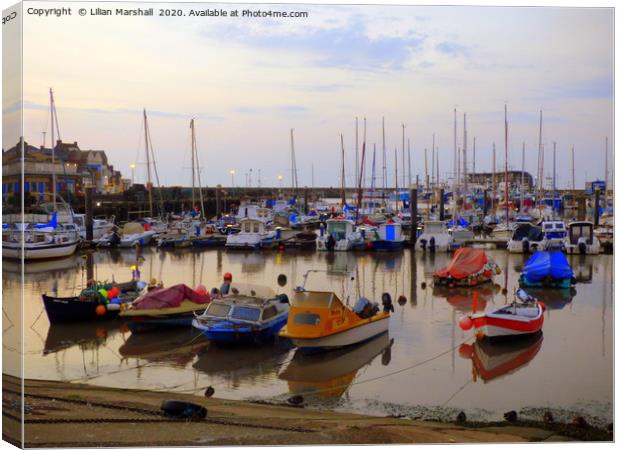 Sunrise over Bridlington Harbour.  Canvas Print by Lilian Marshall