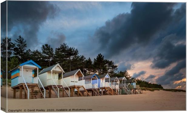 Wells-next-the-sea Beach Huts at Sunset Canvas Print by David Powley