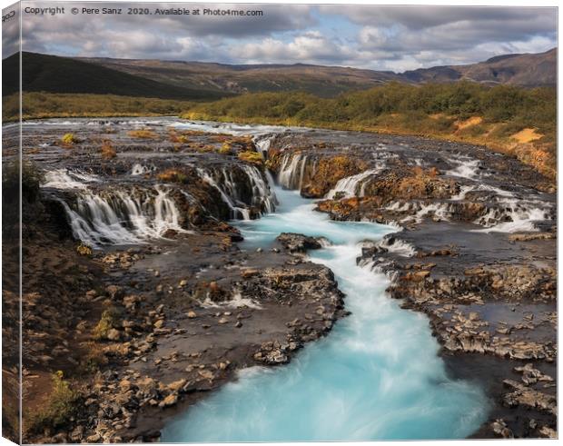 Beautiful Turquoise Bruarfoss Waterfall, Iceland  Canvas Print by Pere Sanz