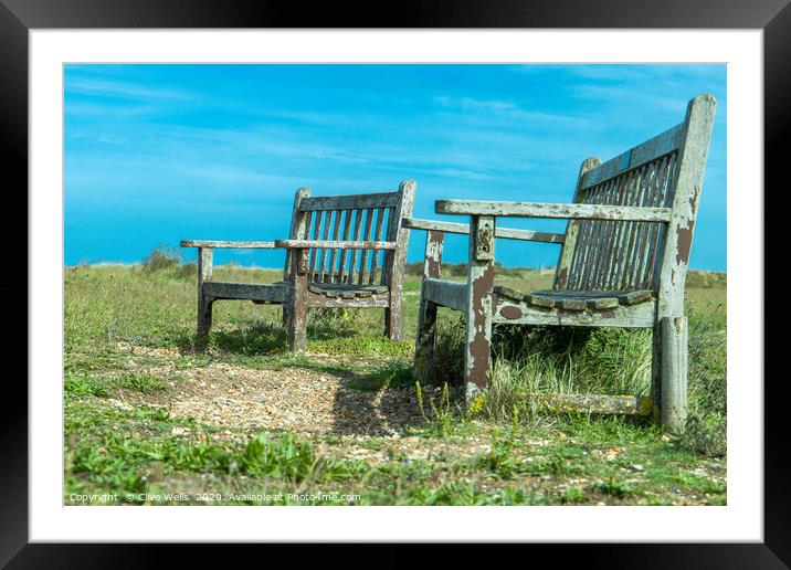 Well worn seats at Snettisham beach in Norfolk Framed Mounted Print by Clive Wells