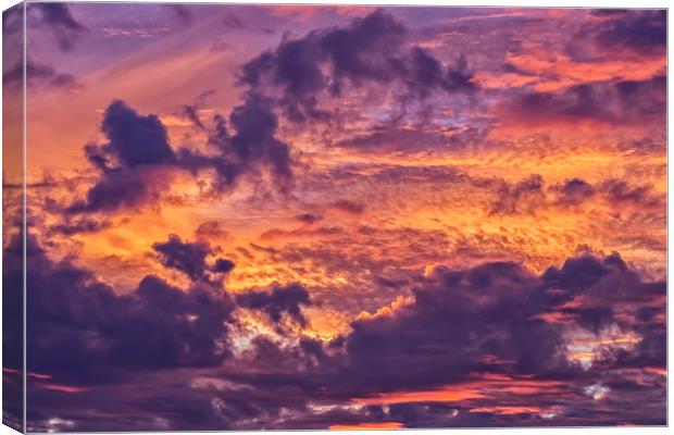 Sunset clouds at summer Canvas Print by Arpad Radoczy