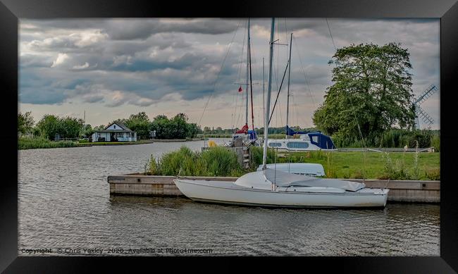A view down the River Thurne in the Norfolk Broads Framed Print by Chris Yaxley