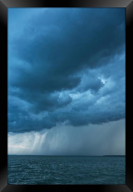 Big powerful storm clouds Framed Print by Arpad Radoczy