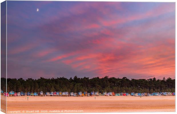Colourful sunset with moon rising. Canvas Print by Stuart Hill