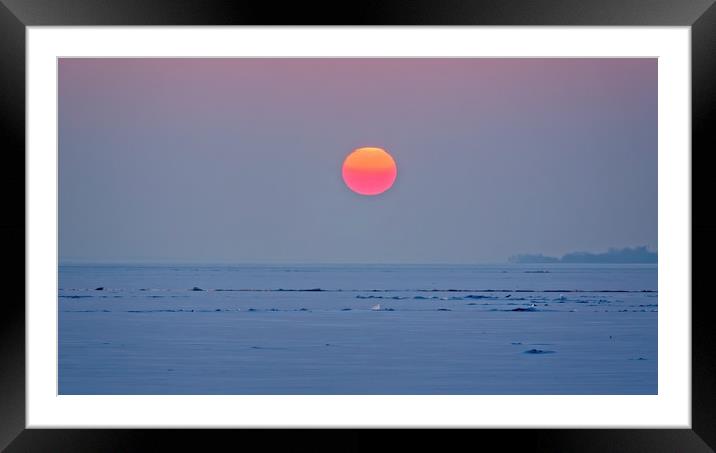 Winter sunset over the lake Framed Mounted Print by Arpad Radoczy