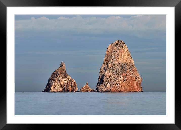 Rocks on the ocean Framed Mounted Print by Arpad Radoczy