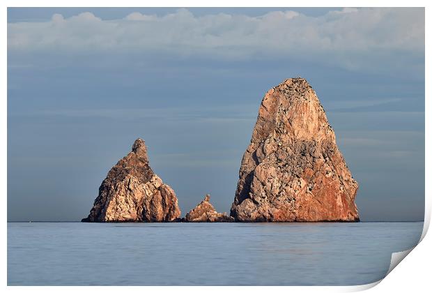 Rocks on the ocean Print by Arpad Radoczy