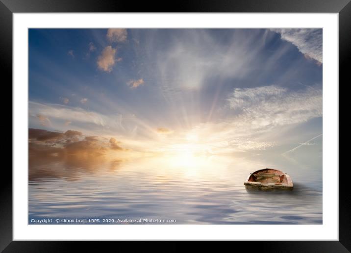 Old rowing boat adrift at sea Framed Mounted Print by Simon Bratt LRPS