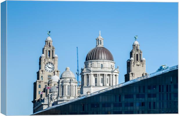 Three Graces above a modern building Canvas Print by Jason Wells